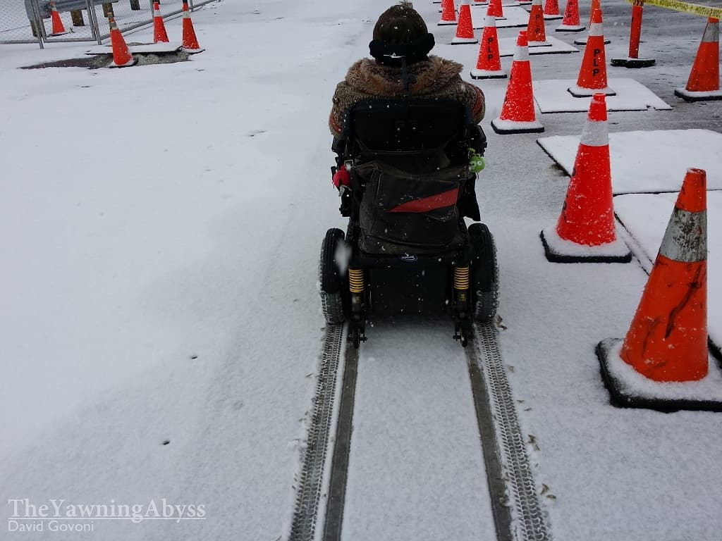 Lene driving through fresh snow